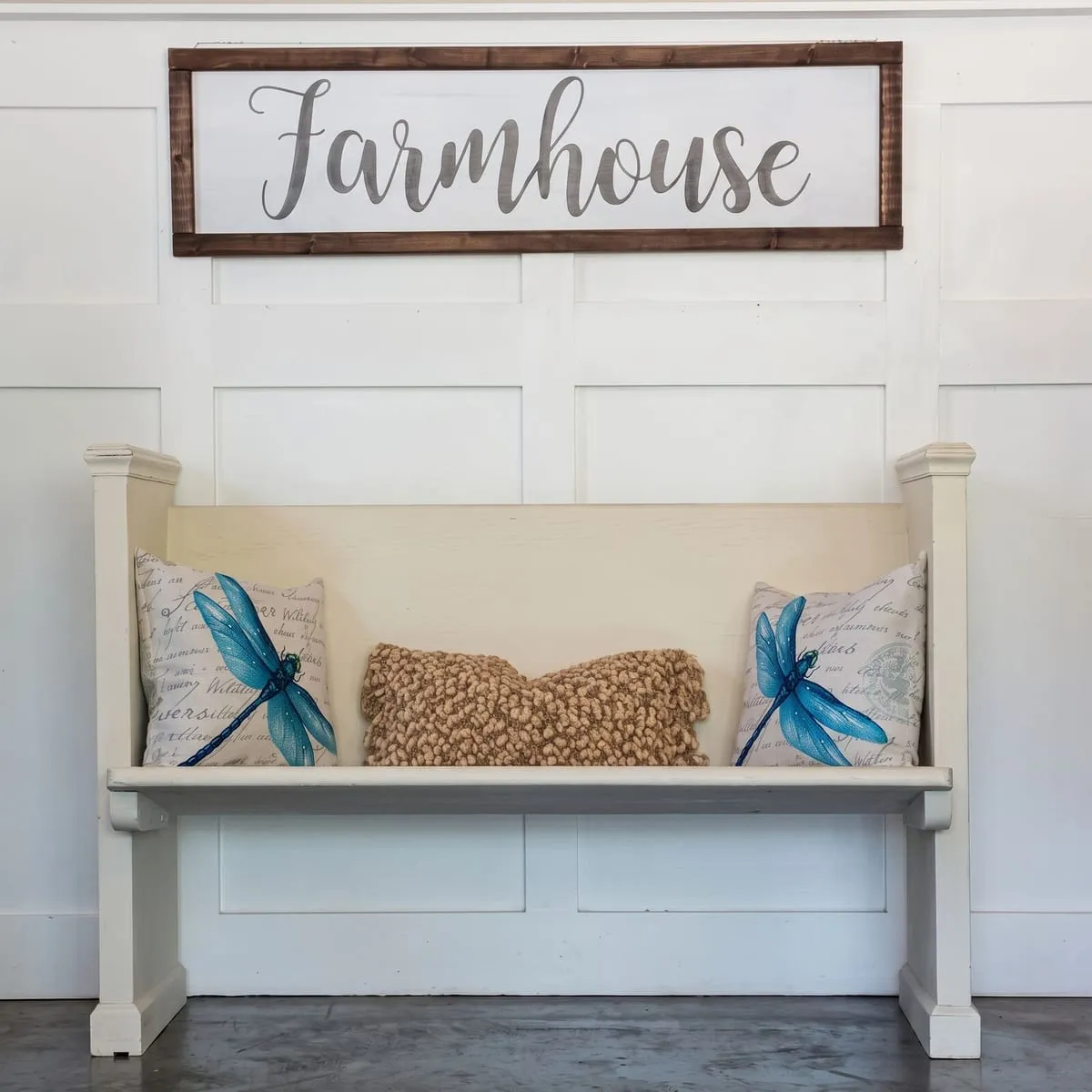 Vintage church pew painted in a warm cream